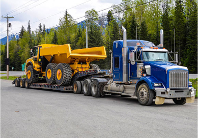 heavy machinery moving - heavy machinery shifting - machine mover singapore - machine relocation services - machine moving company